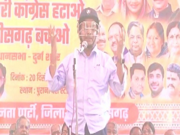 BJP leader Ajay Chandrakar in cricket helmet during the event. (Photo/ANI)