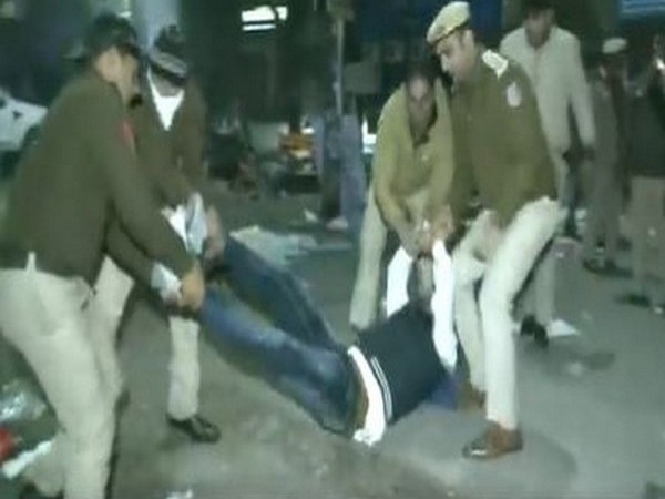 Police detaining the protestors in Delhi. (Photo/ANI)