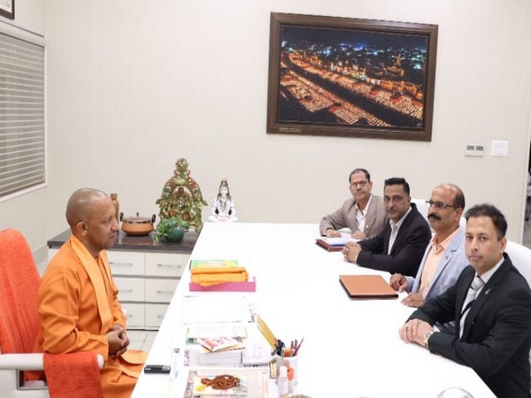 Group of Indian entrepreneurs meet UP CM Yogi Adityanath on Wednesday. (Photo: ANI)