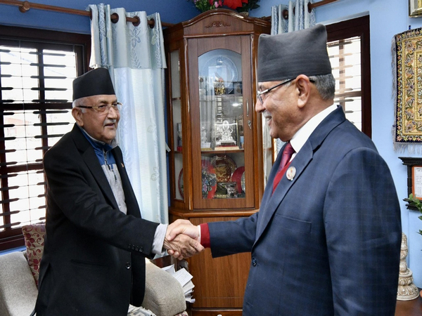 Nepal's Maoist Center Chairman Pushpa Kamal Dahal with Unified Marxist-Leninist president KP Sharma Oli (Image Credit: Oli's Secretariat)