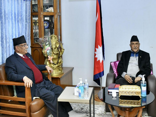Nepal's Maoist Center Chairman Pushpa Kamal Dahal with Unified Marxist-Leninist president KP Sharma Oli (Image Credit: Oli's Secretariat)