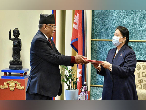 Nepal's Maoist Center's Pushpa Kamal Dahal submitting application claiming Prime Ministership. (Photo Credit: President Office)