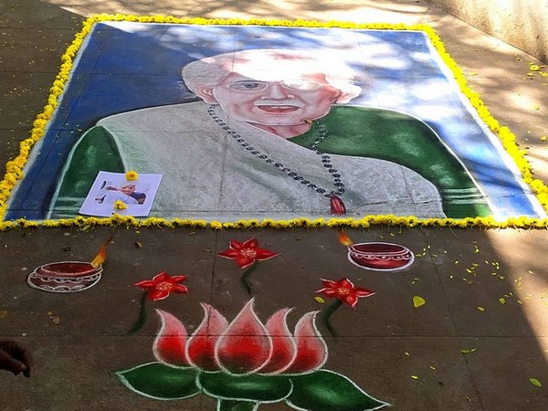 Shankar, a physically disabled artist from Coimbatore drew Heeraben Modis's image on the ground using chalk powder (Photo/ANI)