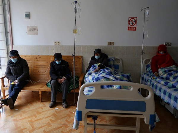 Elderly patients receive IV drip treatment at a clinic in a village of Lezhi county in Ziyang, Sichuan province, China December 29, 2022. (Photo Credit: REUTERS)