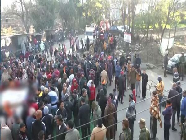 People protesting at Main Chowk in Rajouri's Dangri with dead bodies (Photo/ANI)