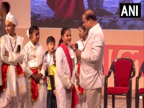 Assam Chief Minister Himanta Biswa Sarma interacts with students of Balmiki school in Guwahati. (Photo/ANI) 