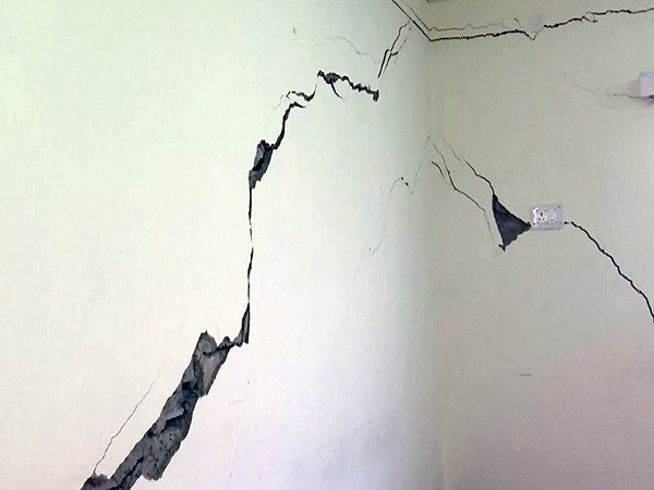 Cracks appeared in a house due to landslides (Photo/ANI)