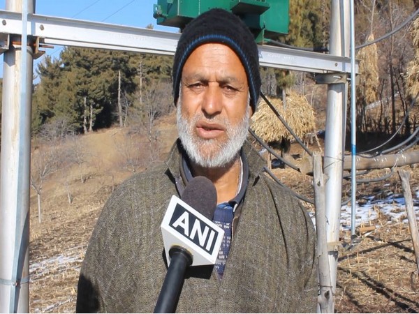 A local thanks administration after electricity reached his remote village in Jammu & Kashmir (Photo/ANI)