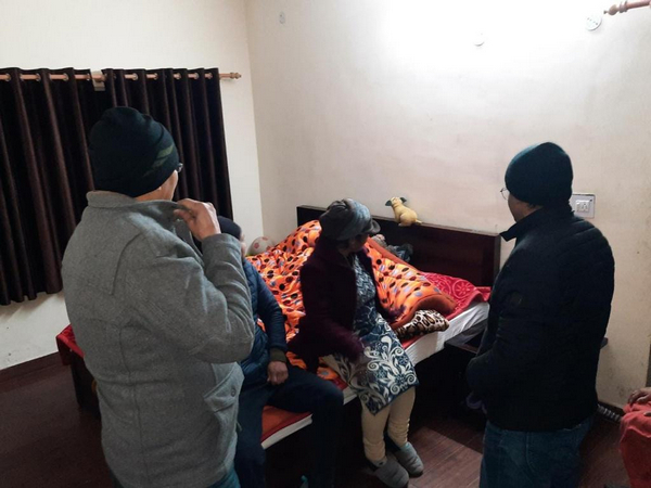 District Magistrate Himanshu Khurana (right) during an inspection in Joshimath. (Photo/ANI)