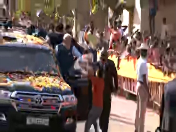 Visual of PM Modi's roadshow when a boy tried to give him garland (Photo:ANI)