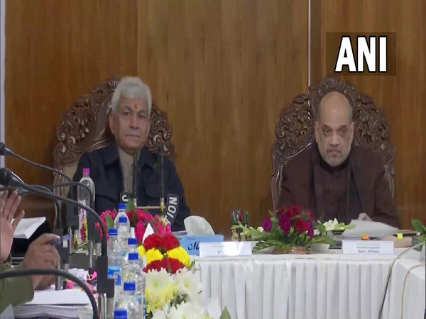 Union Home Minister Amit Shah (R), J-K Lieutenant Governor Manoj Sinha (L) in Jammu