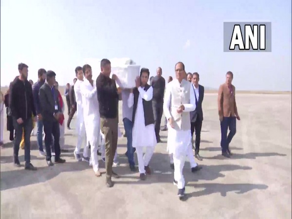 CM Shivraj Singh Chouhan receives Sharad Yadav's mortal remains in Bhopal. (ANI/Photo)