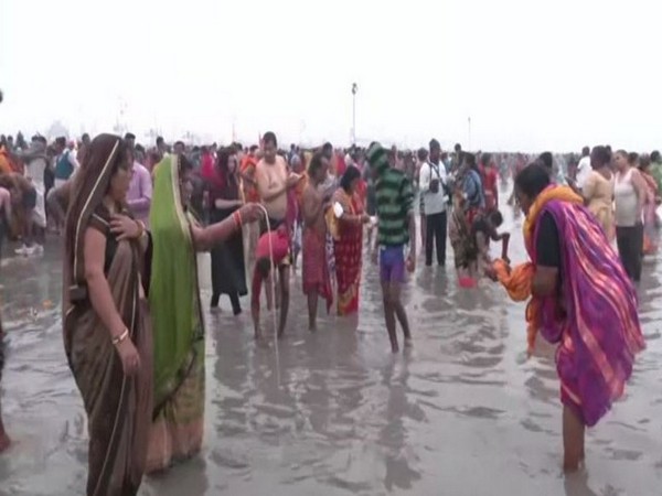 Devotees gather for the holy dip in the Ganges at Gangsagar. (Photo/ANI)