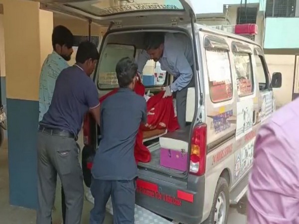 A body being taken for post mortem after 4 members of a family died in Hyderabad(Photo/ANI)