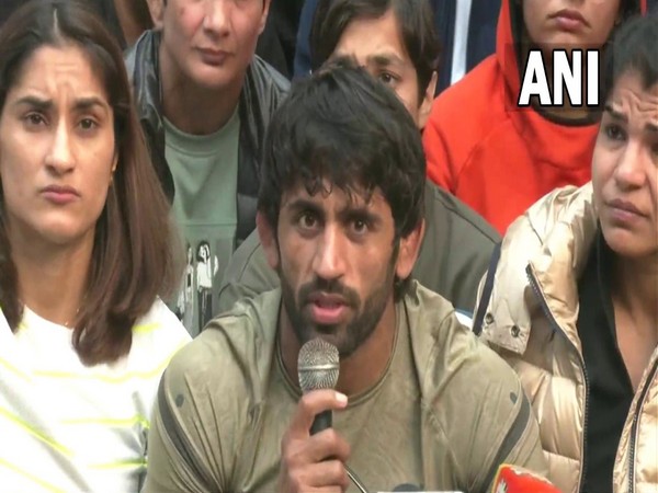 Bajrang Punia, Vinesh Phogat and Sakshee Malikkh addresiing the media (Photo: ANI)