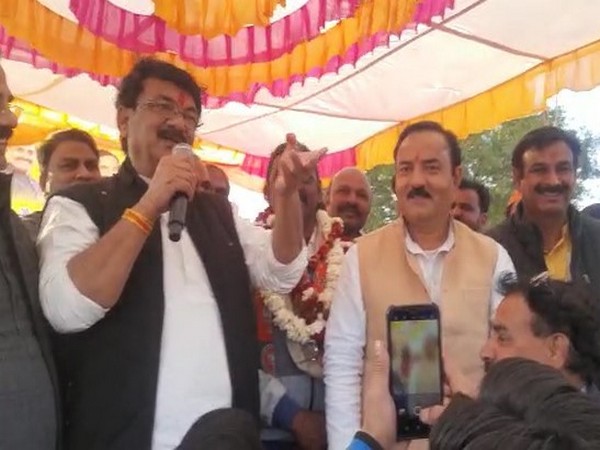 Panchayat and Rural Development Minister Mahendra Singh Sisodiya speaking at a public gathering in Ruthiyai town in Guna district