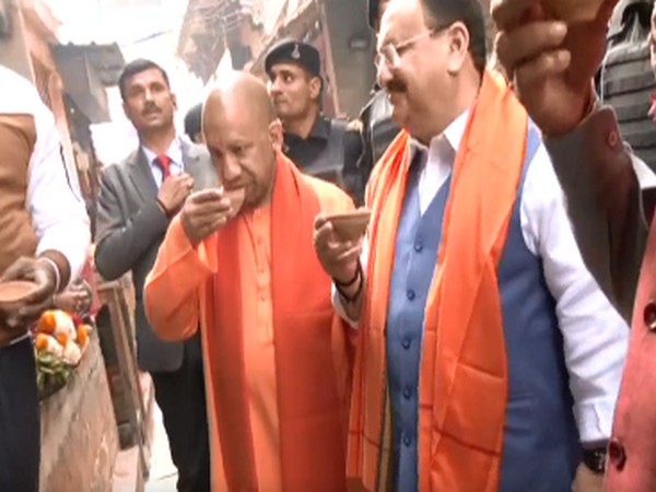 UP CM Yogi Adityanath and BJP national president JP Nadda sipping tea in Varanasi (Photo/ANI)