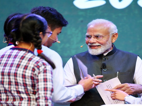 Prime Minister Narendra Modi with students (File photo/ANI)