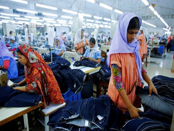 Workers sort clothes at a garment factory in Bangladesh. (Photo Credit - Reuters)