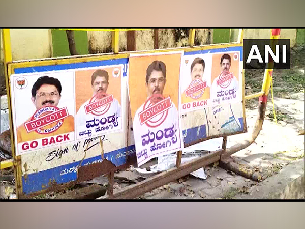 Visuals of posters pasted in Mandya (Photo/ANI)