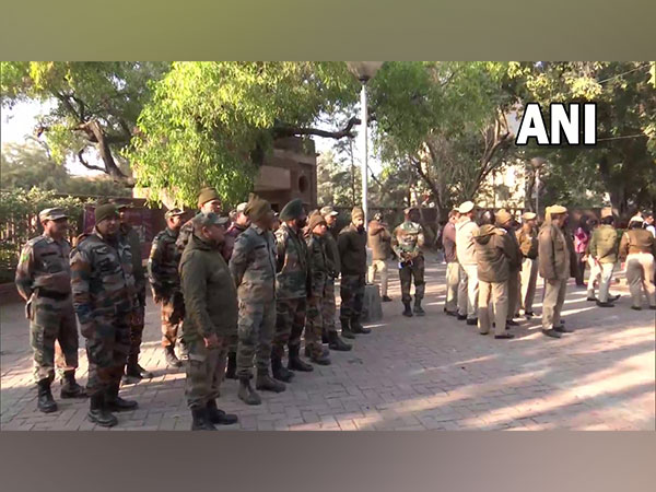 Security personnel deployed outside the Faculty of Arts at the University of Delhi (Photo/ANI)
