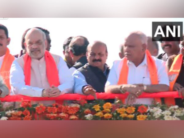 Union Home Minsiter Amit Shah (left), CM Bommai (centre), former CM Yediyurappa (right) during a roadshow in Dharwad (Photo/ANI)