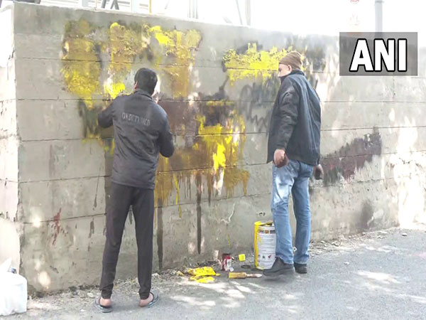 Visual of graffiti being removed from a wall in Delhi (File Photo/ANI)