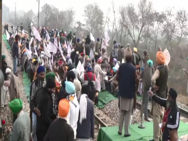 Farmers protesting on Railway tracks (Photo/ANI)