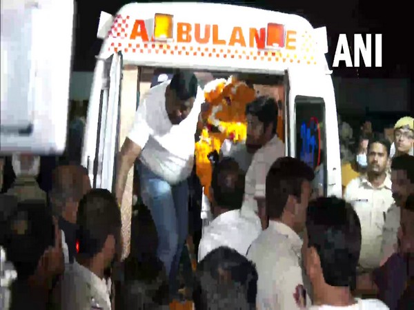 The mortal remains of the minister being brought to his official residence. (Photo/ANI)