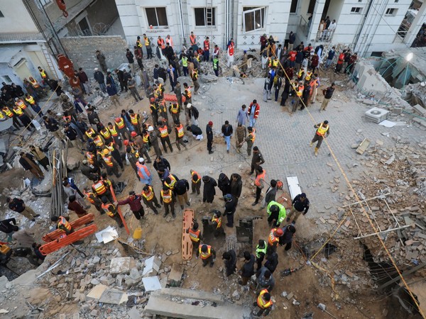 Rescue workers look for survivors in a mosque at Peshawar (Photo Credit: Reuters)