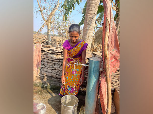 Tribal woman getting fresh drinking water under Jal Jeevan Mission (Photo/ANI)
