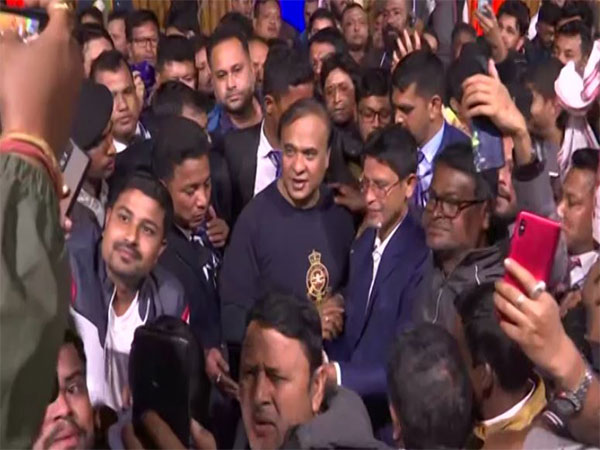 Assam Chief Minister Himanta Biswa Sarma clicking selfies with fans on his birthday. (Photo/ANI) 