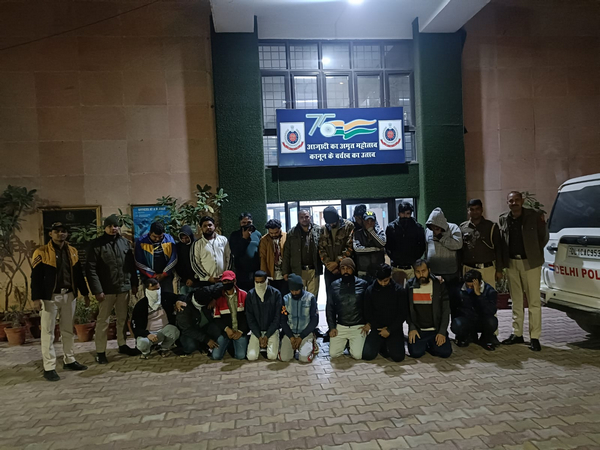 Delhi police team with arrested accused. (Photo/ANI)