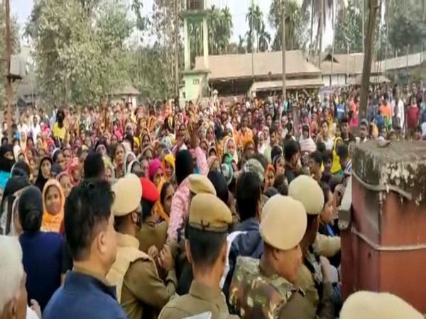 Women in large number protest outside Tamarhat police station in Dhubri (Photo/ANI)