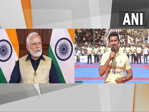 PM Narendra Modi and BJP MP and Olympic medallist Rajyavardhan Singh Rathore (Image: ANI)