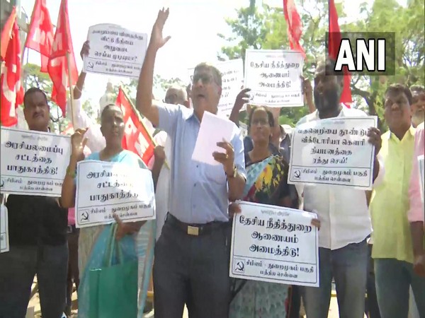 CPI (M) memebers staging protest near Madras High Court (Photo/ANI)