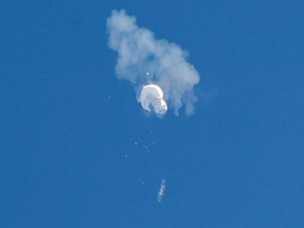 The suspected Chinese spy balloon drifts to the ocean after being shot down off the coast in Surfside Beach. (Photo Credit - Reuters)