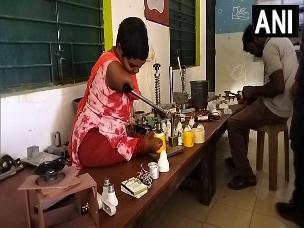 Specially-abled girl making product at the center (Photo/ANI)