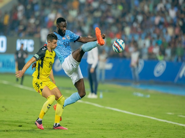 Mumbai City FC captain Mourtada Fall (In blue) in action during Indian Super League (Image: Mumbai City FC)