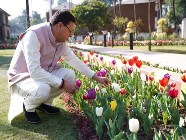 CM Pushkar Singh Dhami inspecting the Tulip garden (Photo/ANI)
