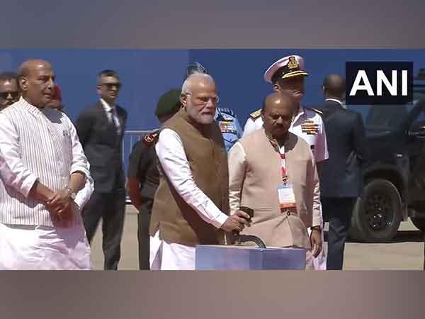 Prime Minister Narendra Modi (centre), Defence Minister Rajnath Singh (left) Chief Minister Basavaraj Bommai (right) (Photo/ANI)