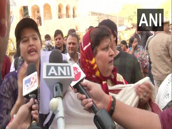 Locals protesting DDA's action in Delhi's Mehrauli (Photo/ANI)