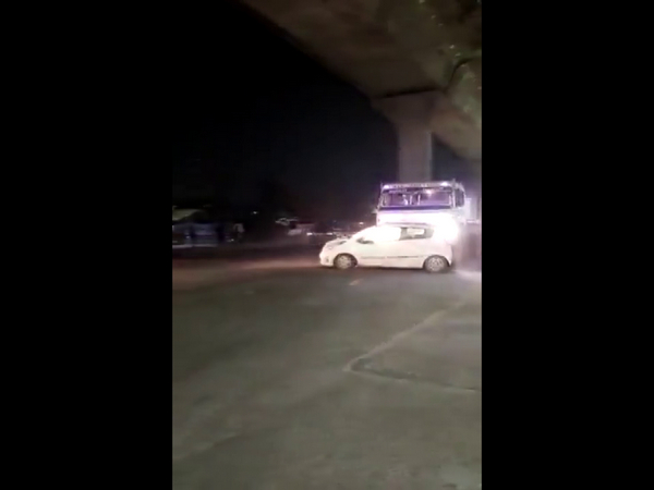 Container driver drags car in Meerut (Photo/ANI)