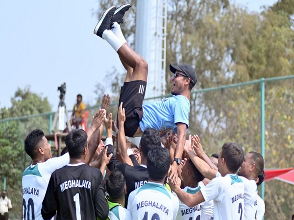 Meghalaya players celebrating with coach (Photo: AIFF Media) 