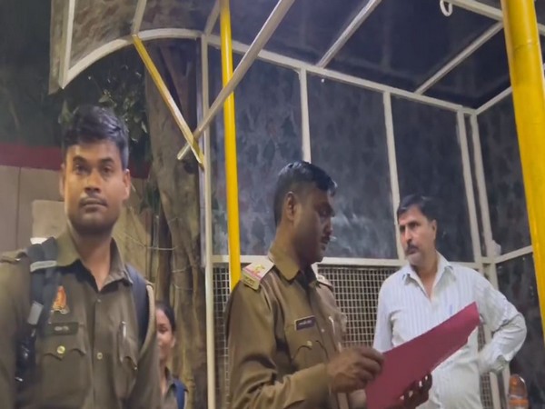 Kanpur police at singer Neha Singh Rathore's residence (Photo/ ANI)