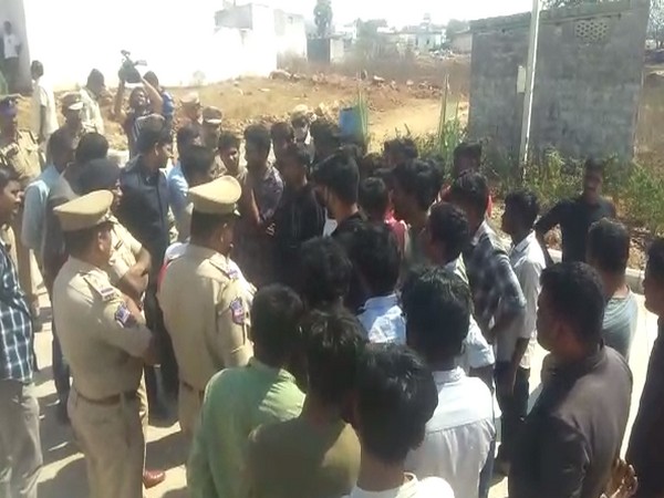 Police team with locals in Hyderabad (Photo/ANI)