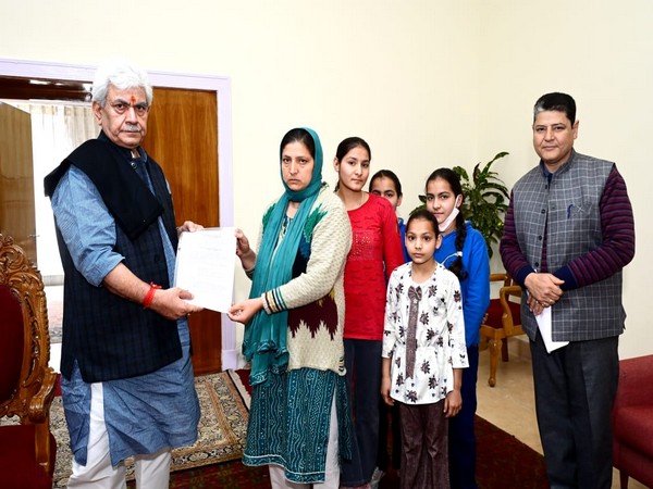 Manoj Sinha handing over appointment letter (Photo/ANI)