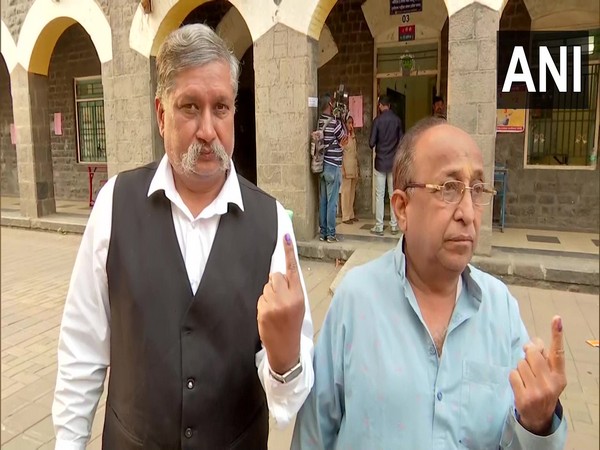 Outside a polling booth at Nutan Marathi Vidyalaya in Pune (Photo/ANI)