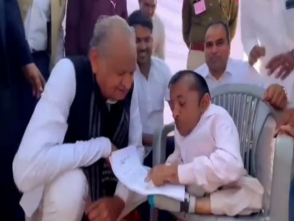 Omprakash Kumawat with Rajasthan CM Ashok Gehlot (Photo/ANI)