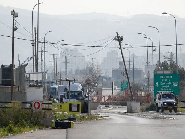 Israeli troops stand guard at the Hawara checkpoint near Nablus, after it was closed following a shooting. (Photo Credit - Reuters)